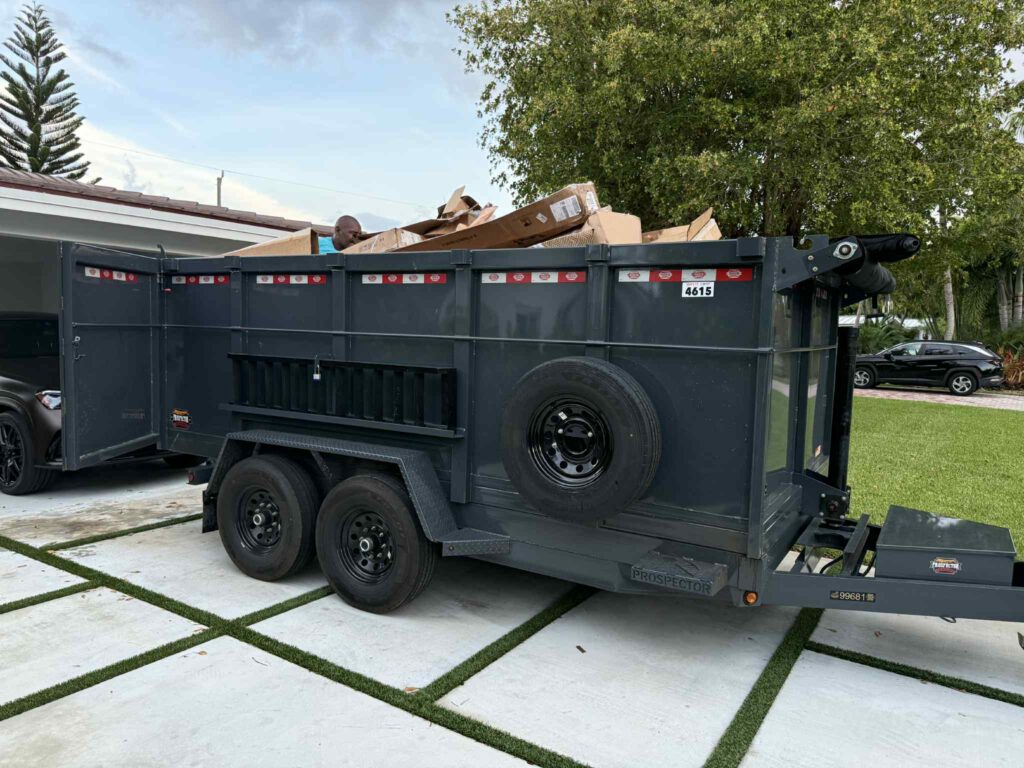 High-Caliber Junk Removal's professional black trailer for hauling large loads.