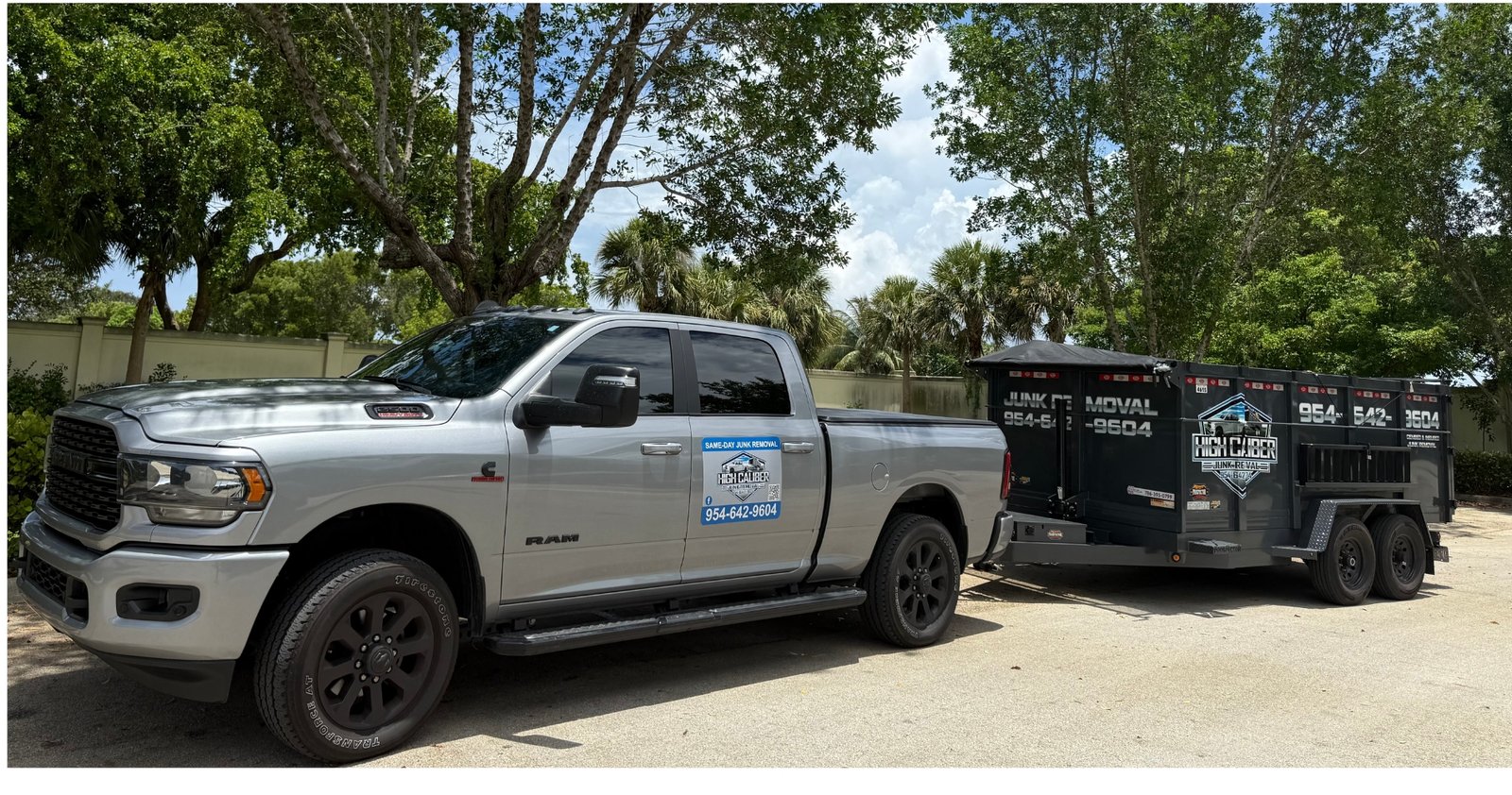 High Caliber Junk Removal silver Dodge Ram 2500 with black dump trailer parked in Broward County, Florida for same-day junk pickup