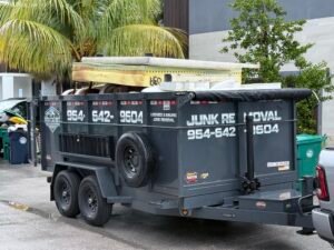 High Caliber Junk Removal trailer loaded with junk in South Florida