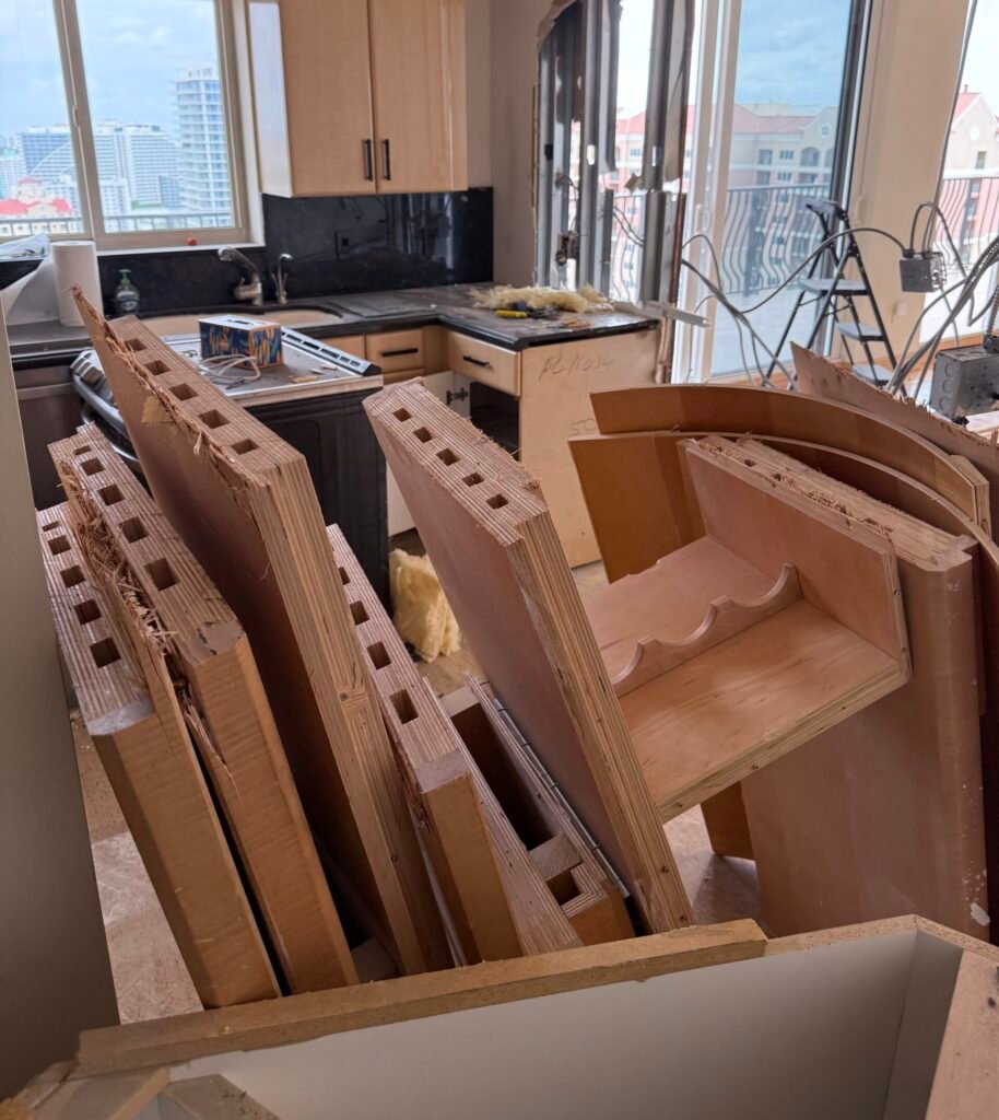 Kitchen renovation debris and removed cabinets in South Florida