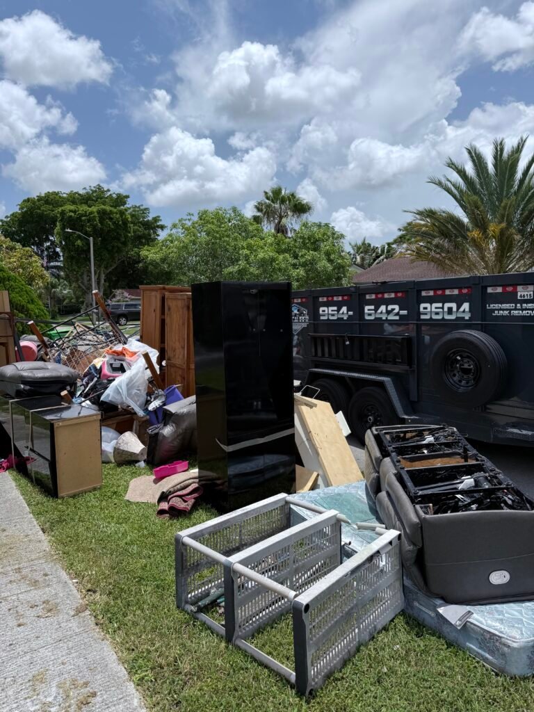 Junk removal job with High Caliber Junk Removal trailer