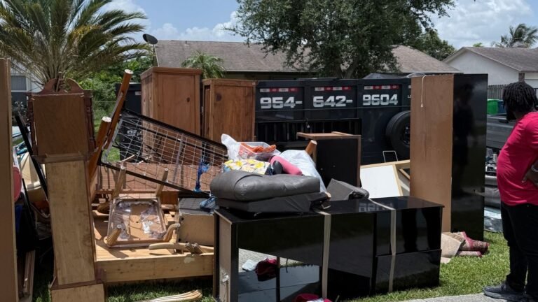 Furniture and household items being removed during a cleanout