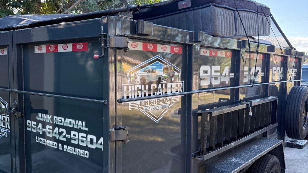 High Caliber Junk Removal trailer loaded with household junk