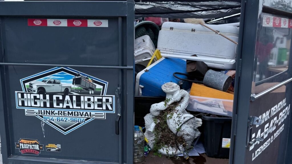 Junk removal trailer loaded with household items