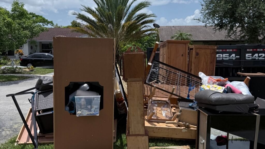 roperty cleanout with junk removal trailer in Broward County